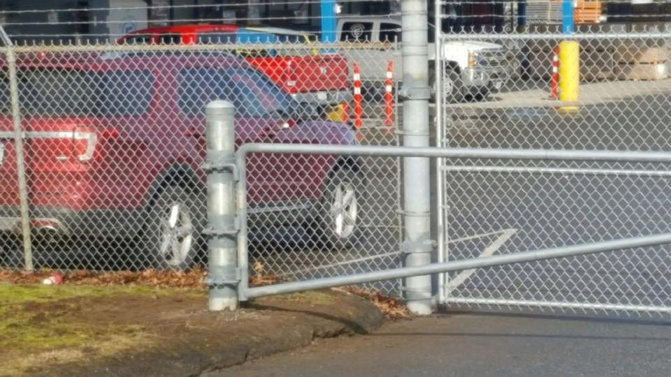 Vehicle-entrance barrier gate in Surrey — LS Fencing & Metal Work archive photograph